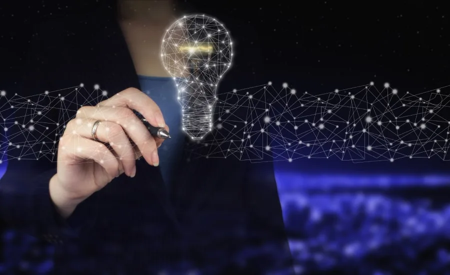 Hand holding digital graphic pen and drawing digital hologram